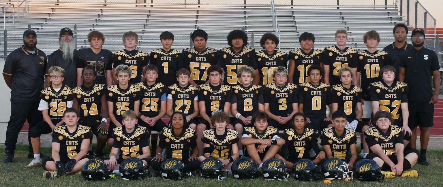 Scottsdale Sabercats team and coaches together in black and gold uniforms